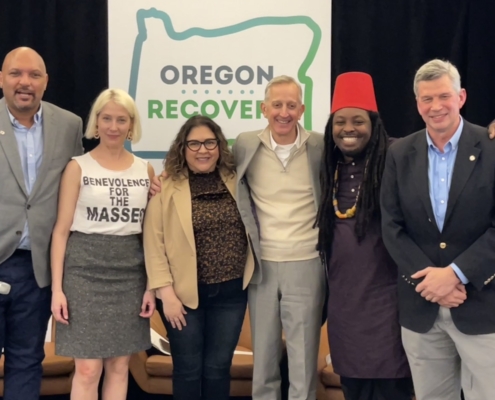 All six 0f the Portland mayoral candidates smile for a group picture.